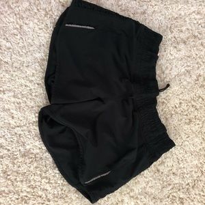 black lululemon ruffle shorts